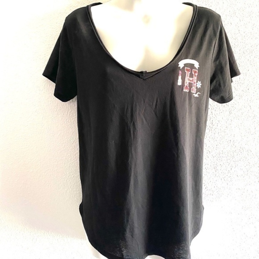 Hollister embellished woman’s black blouse size -L